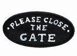 Metal Cast Iron Please Close The Gate Sign Outdoor Wall Hanging Easy to Hang Oval Shaped Plaque Black Background White Text Vintage Look